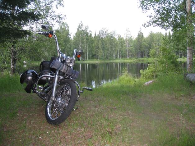 Tara, my Harley Davidson by a lake